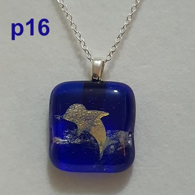 Silver dolphin on blue glass pendant p16
