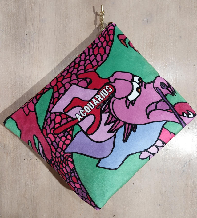 Tatsu. Pochette en velours.