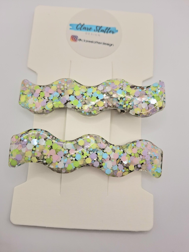 Pastel pink, green and blue wiggle clip pair