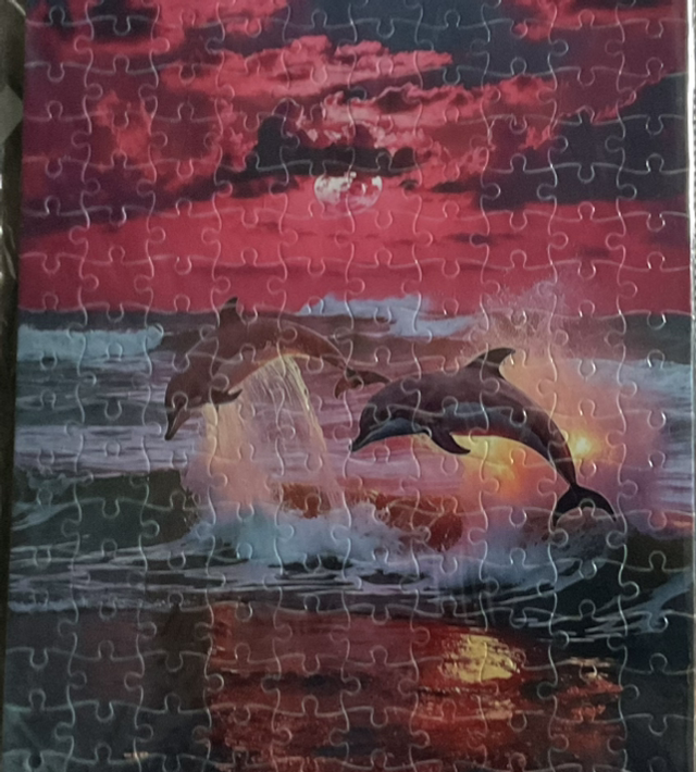 Dolphins swimming limited to 1 A3 200 jigsaw
