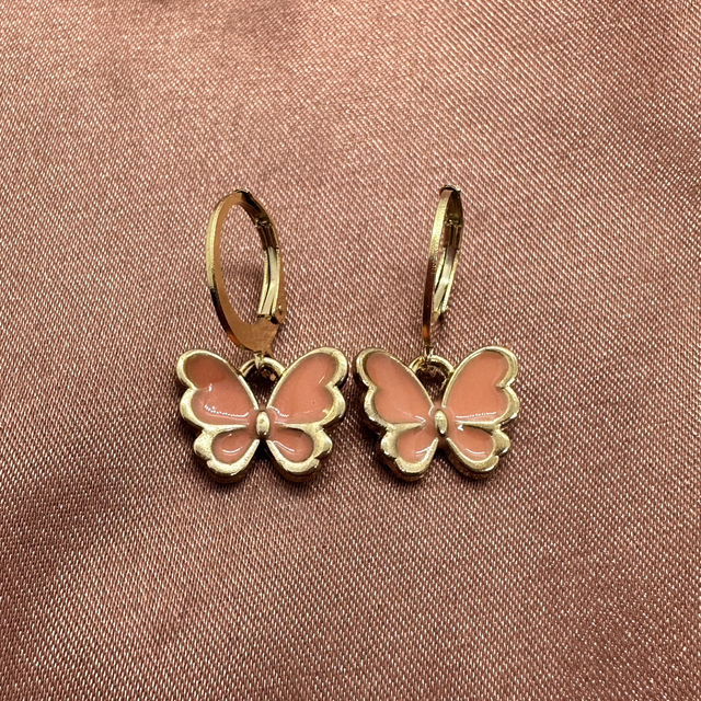 Coral butterfly huggie hoop 