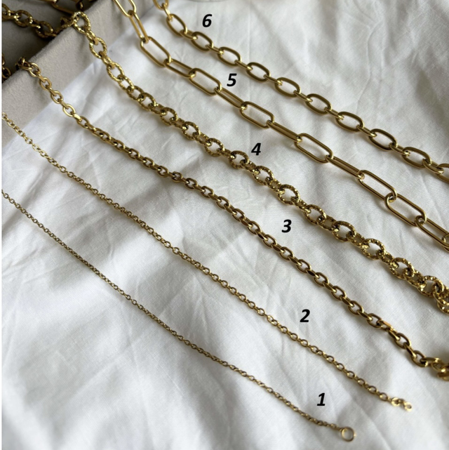 Bracelet avec 4 pendentifs  