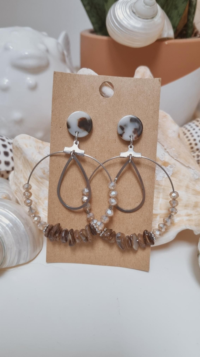 Boucles d'oreilles đ