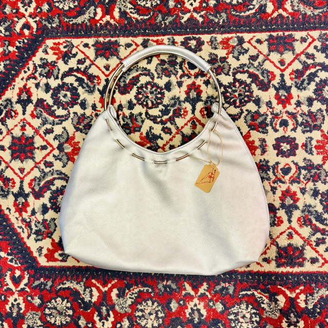 Mala Metálica em Pele