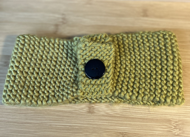 7033. Ladies ear warmers