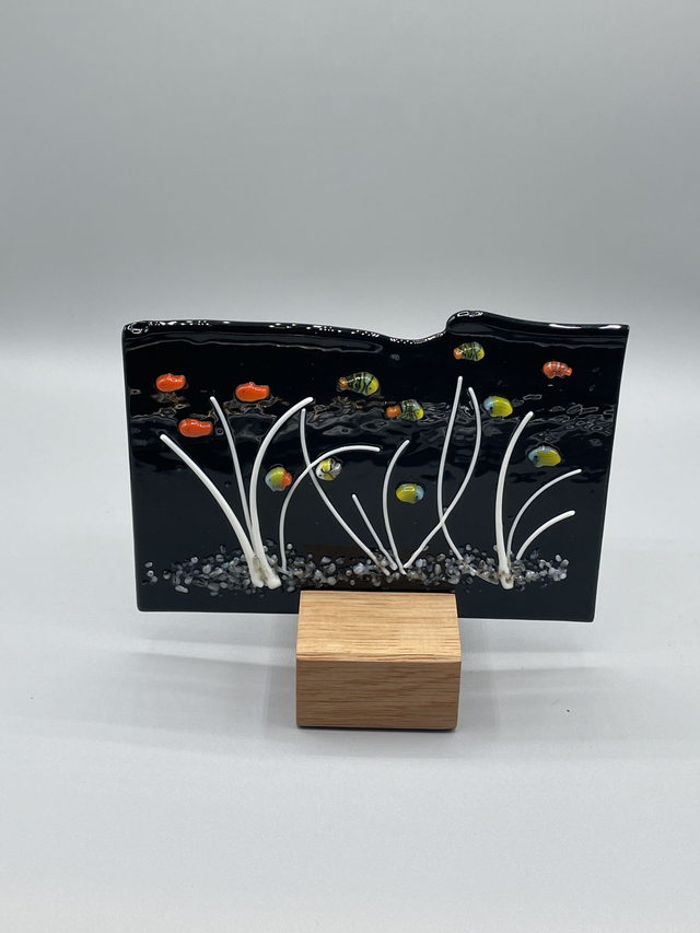 Underwater tropical fish fused glass scene on black opal glass with wooden stand