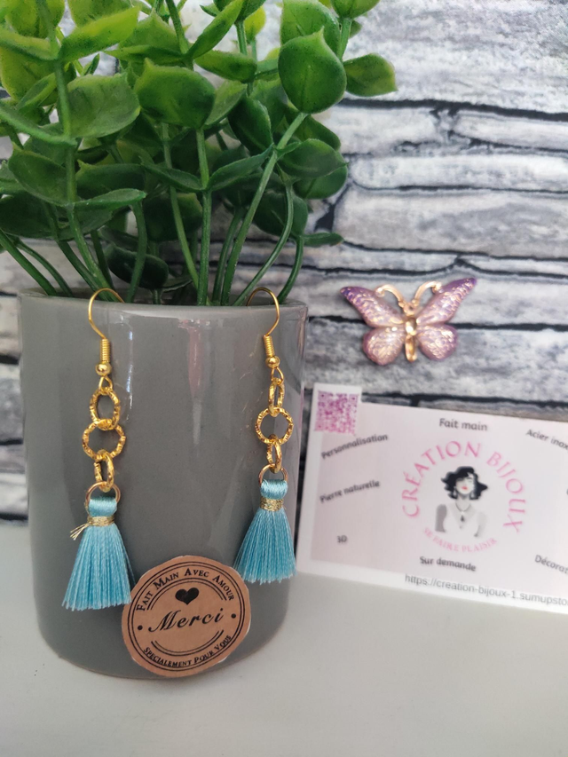 Boucle d'oreille pompon 