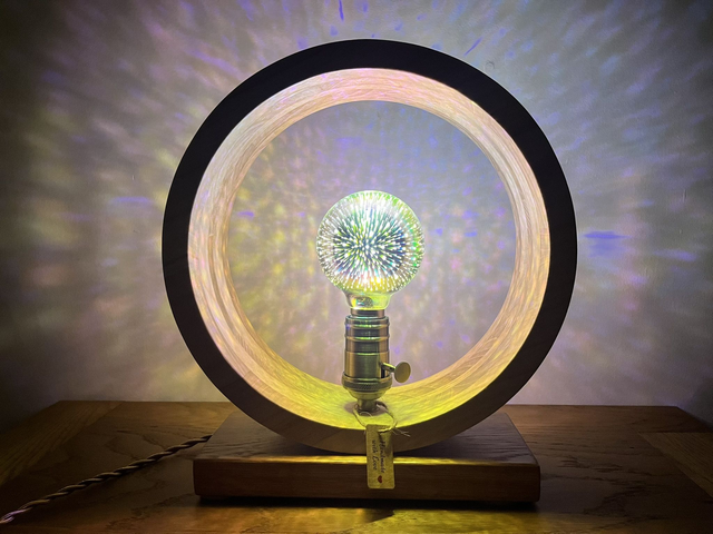 Modern round living room lamp with Edison bulb.