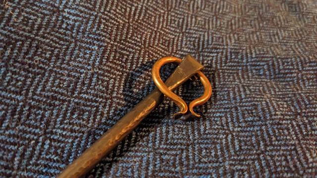 Forged iron brooch pin with copper ring
