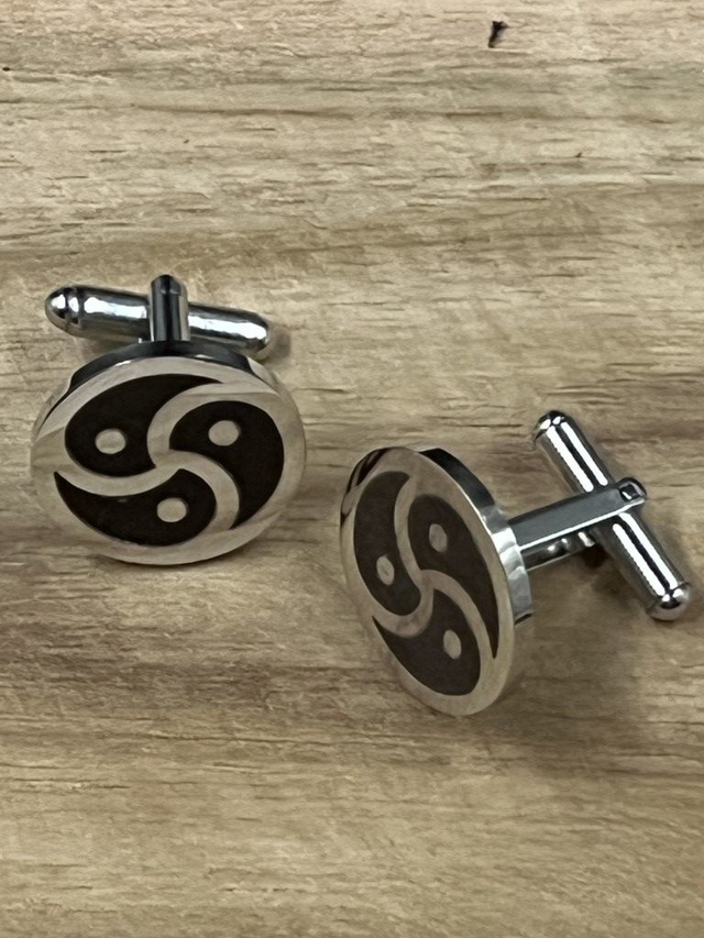 Manchetknoop van RVS met BDSM-symbool