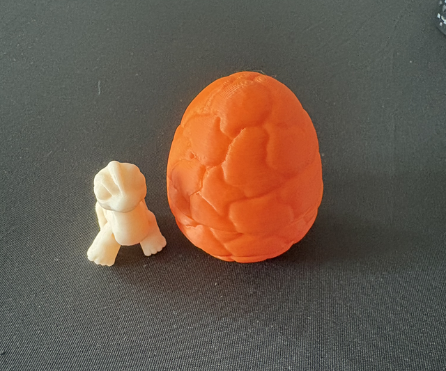 Mystery egg with hidden mystery articulated animal 