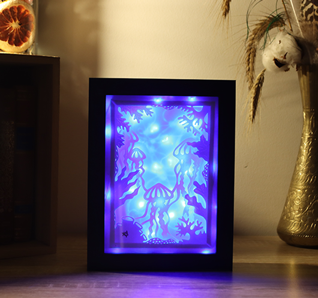 Veilleuse des méduses blanches