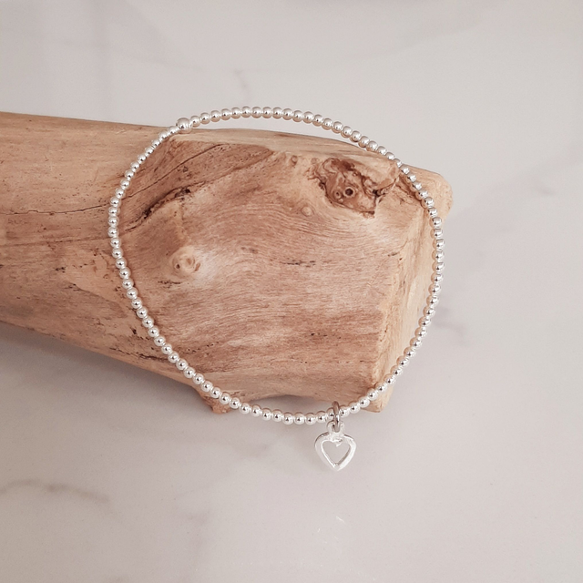 Sterling silver stretch bracelet with heart pendant