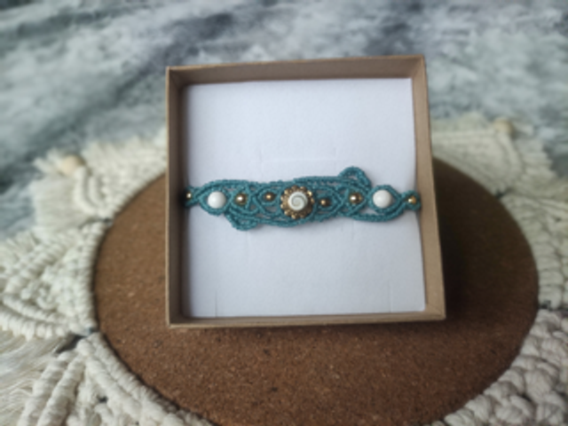 Bracelet bleu avec œil de Sainte Lucie et howlite