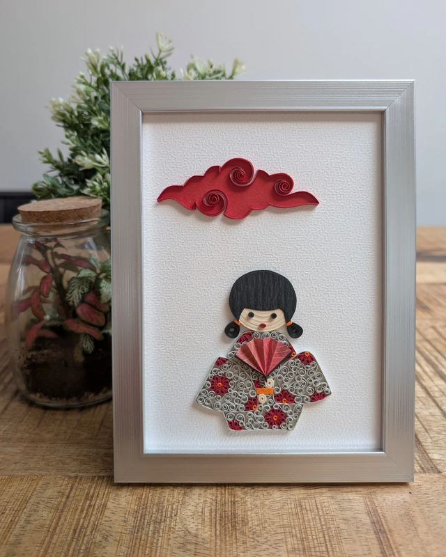 Poupée japonaise et nuage