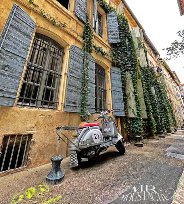 Vespa in the  street .