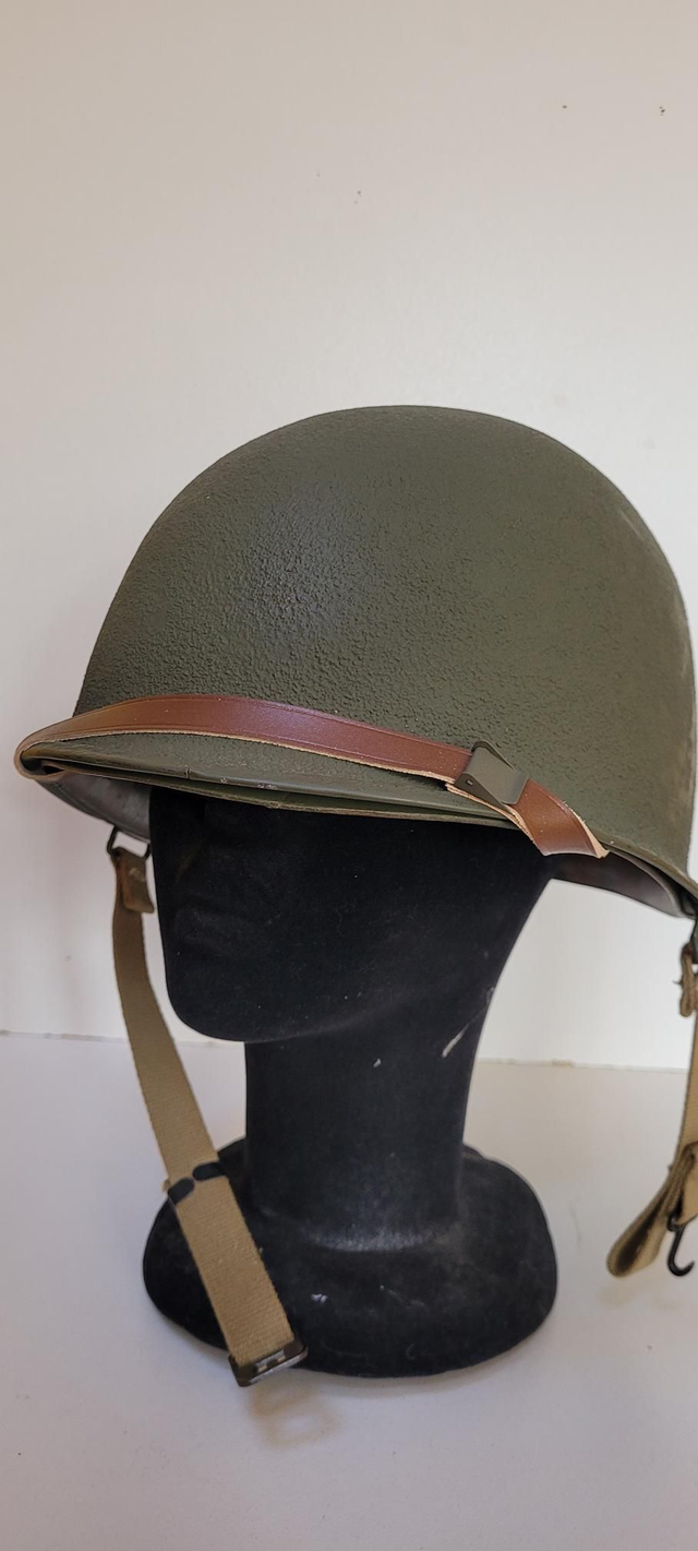 Schleuter original texturing front seam swivel bail with liner by Seaman Paper Company.