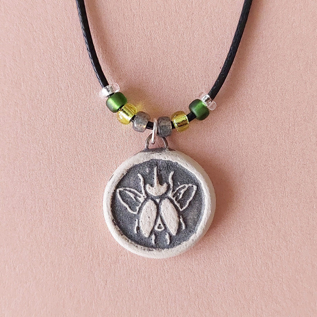 Beetle ceramic necklace - handmade - unisex beetle charm - rustic clay bug bead