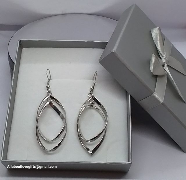 Earings Twisted Hoop Design Plated with Silver.