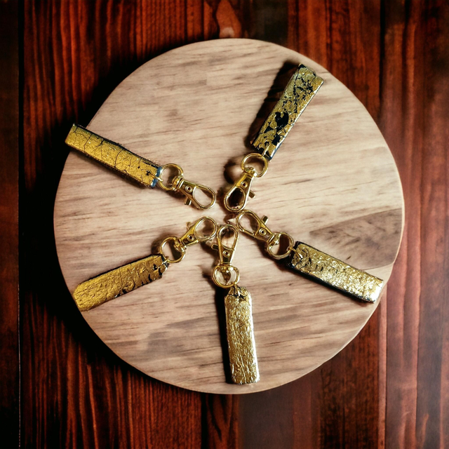 Portes clefs noir et or longs