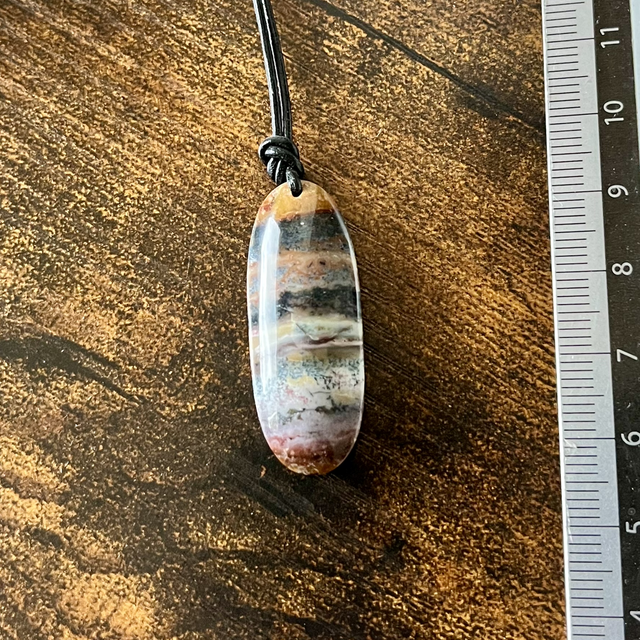Pendentif en Bois Fossilisé