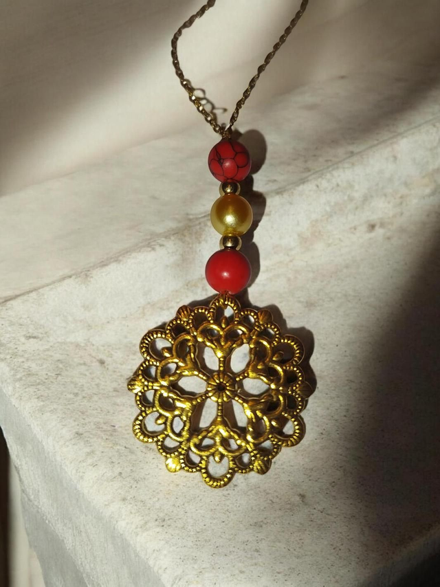 Trio de perles et rosace