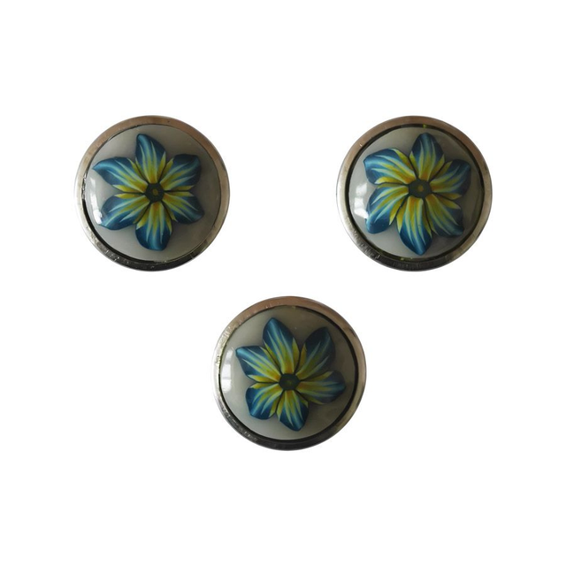 Bouton pression fleur bleu jaune