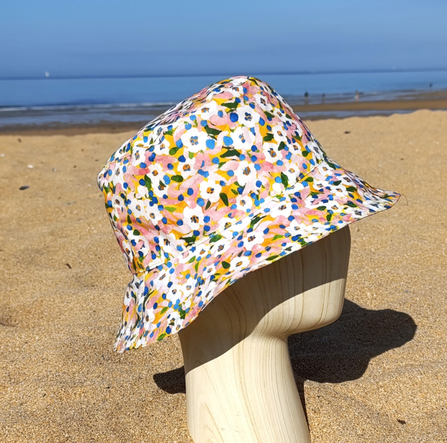 Chapeau de pluie - fleuri jaune et rose