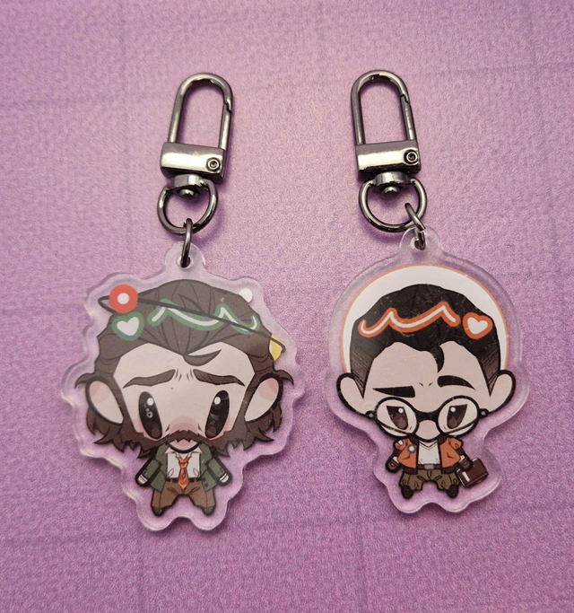 Disco Elysium Silly Little Guy Keychains