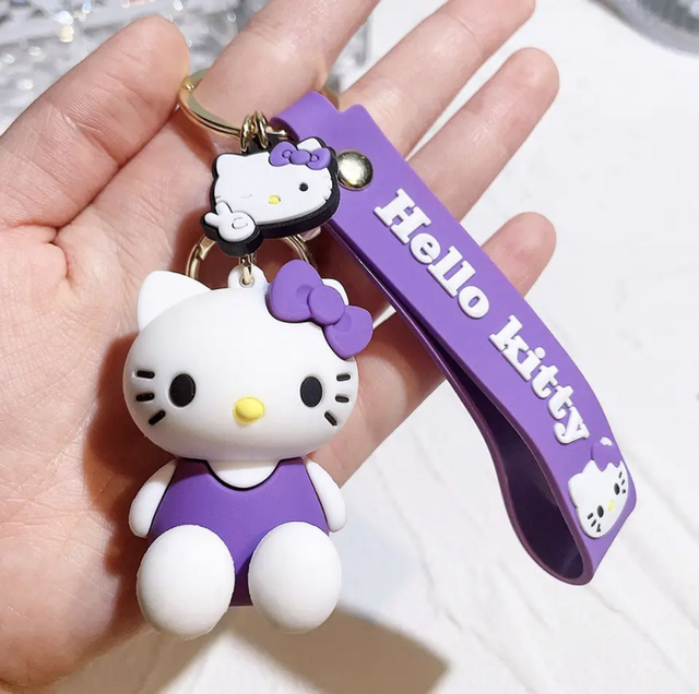 0167 - Hello Kitty - zittend - paars