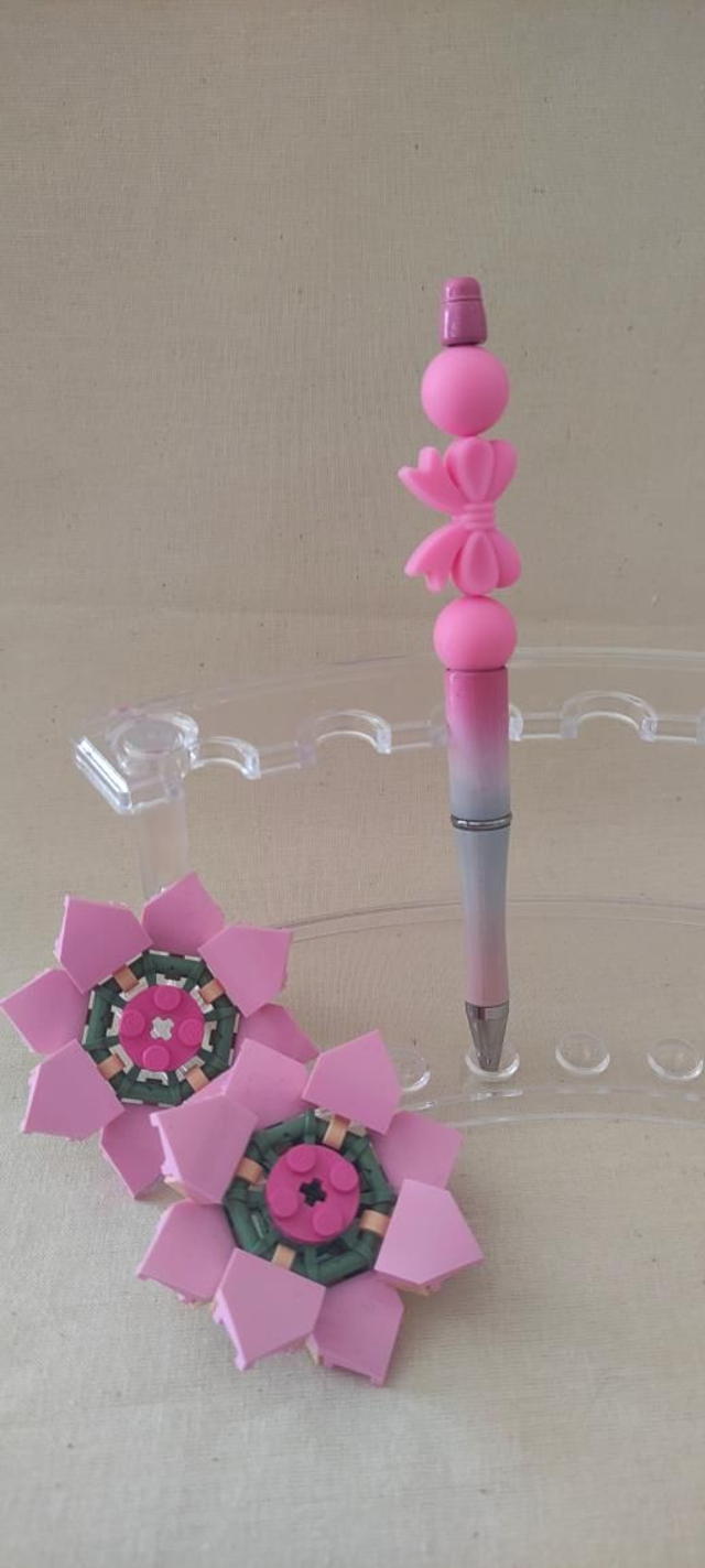 Stylo perle silicone rose pailleté 