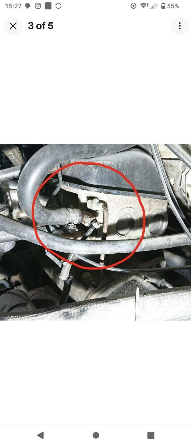 Petrol engine cylinder head coolant pipe with tools