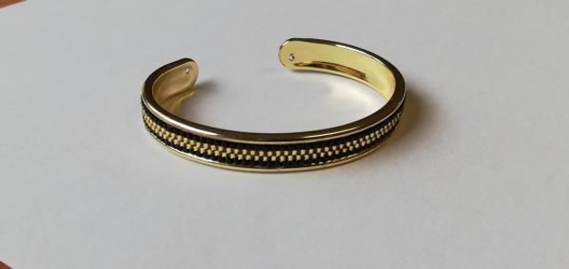 Ligne noire/dorée/noire