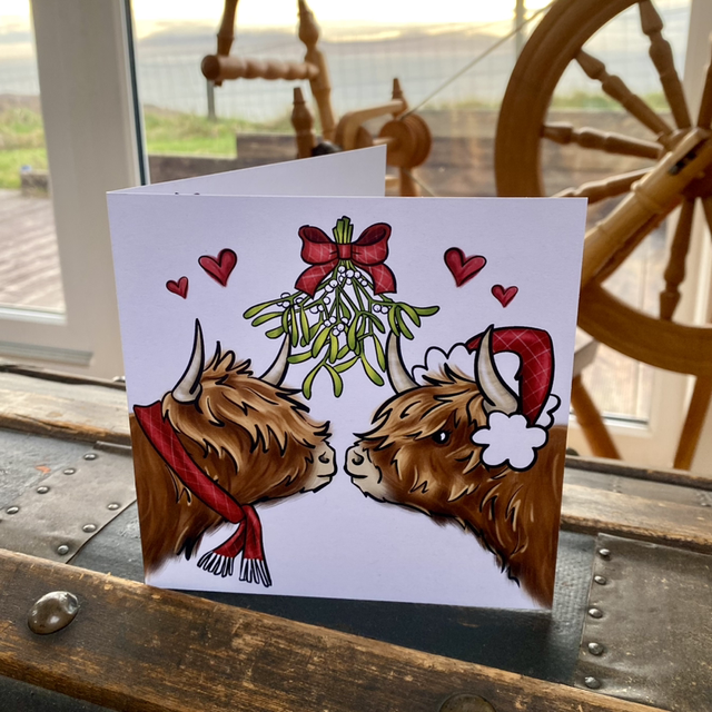 Mistletoe kissing Highland Cows Christmas card