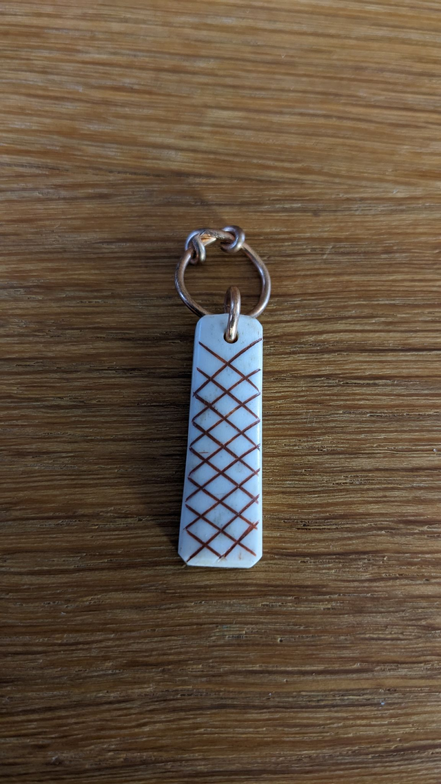 Cross hatched antler pendant