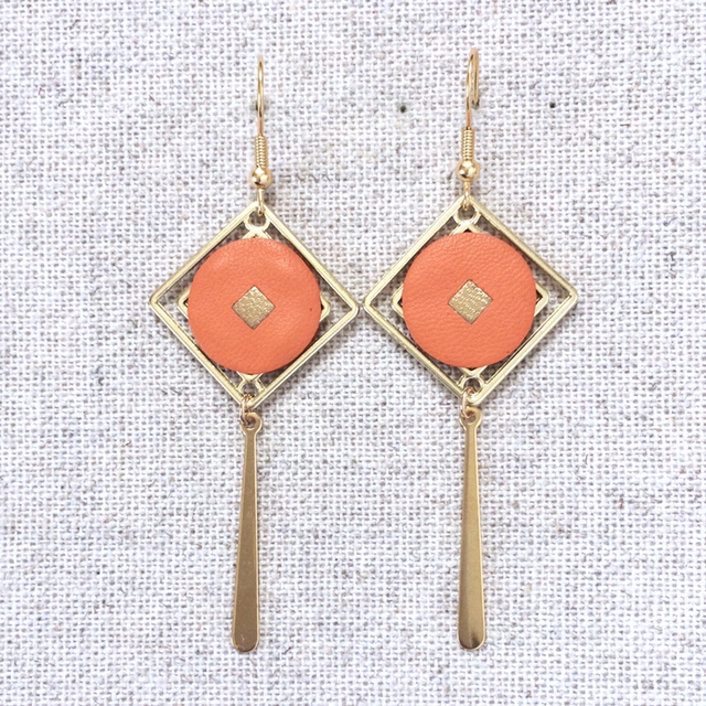 Boucles d’oreilles « Quartet » dorées, cuir orange