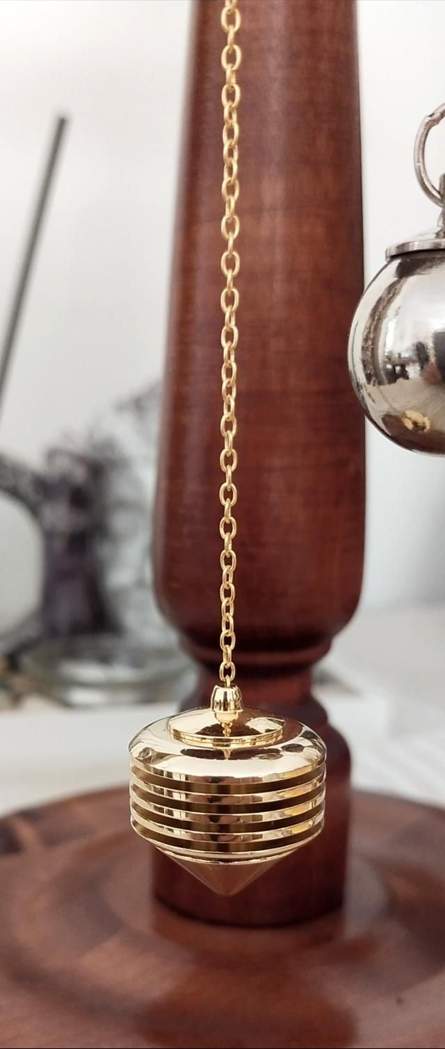 Pendule Ultra Sensoriel Doré