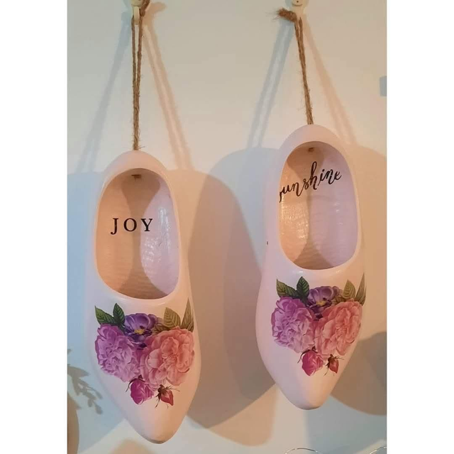 A set of wooden decorative clogs 