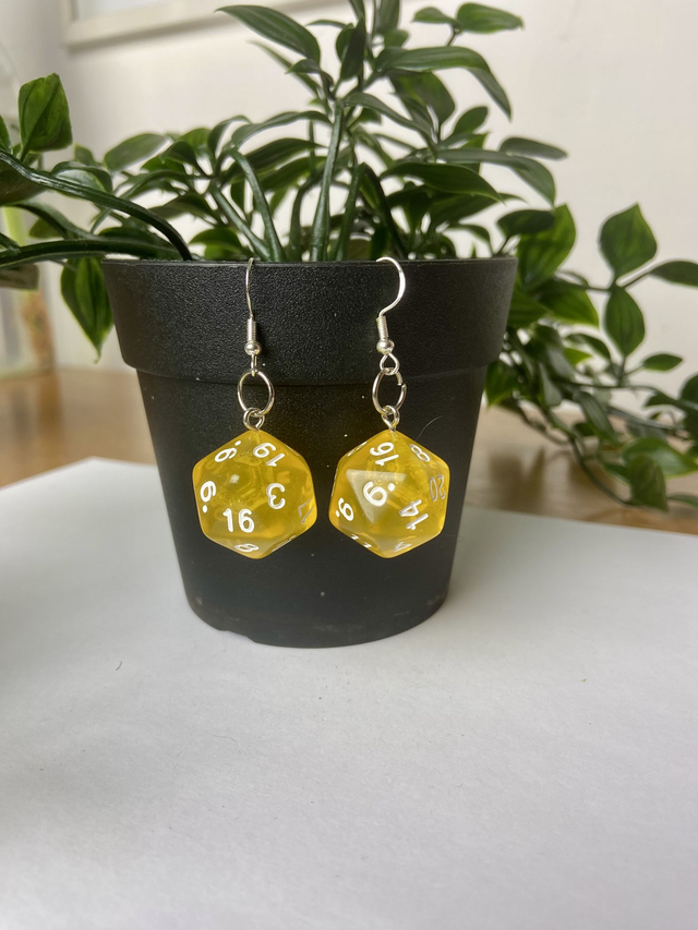 Game dice earrings.