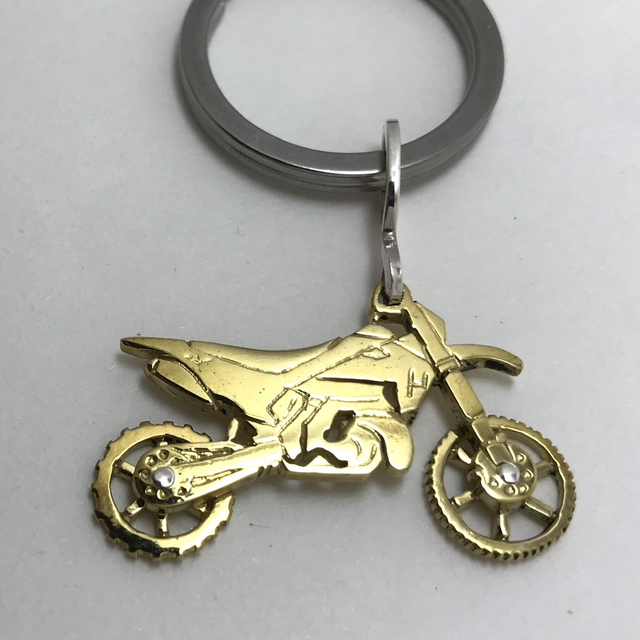 Porte clés motocross 2t articulée en laiton 