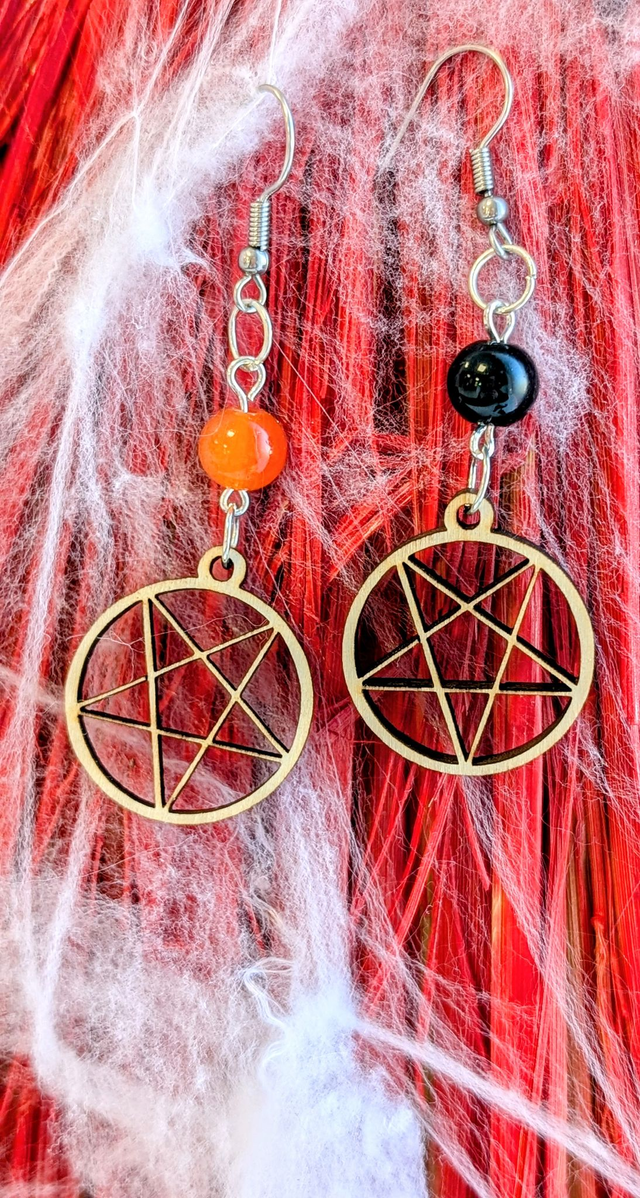 Boucle d&#039;oreilles pentagramme