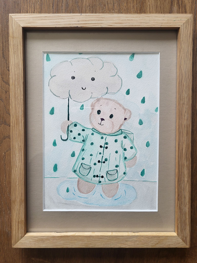 Petit ours sous la pluie