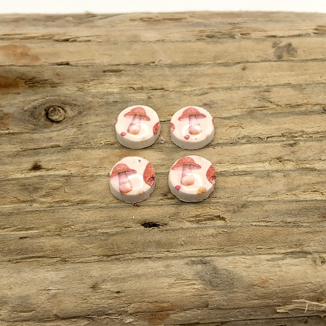 Mini red mushroom studs