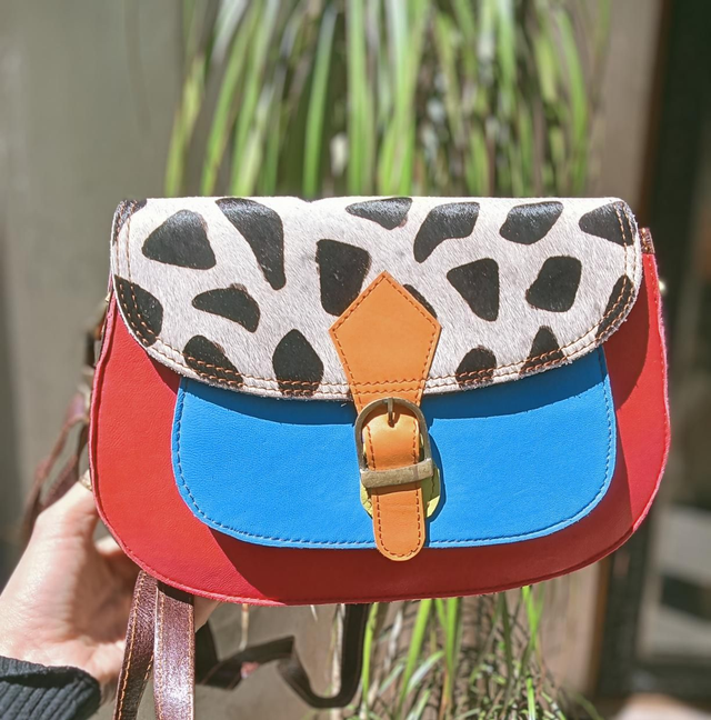 Mala em pele colorida 