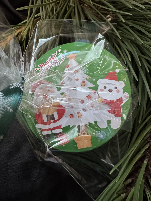 Small Handmade Christmas Candle in a Christmas Tin