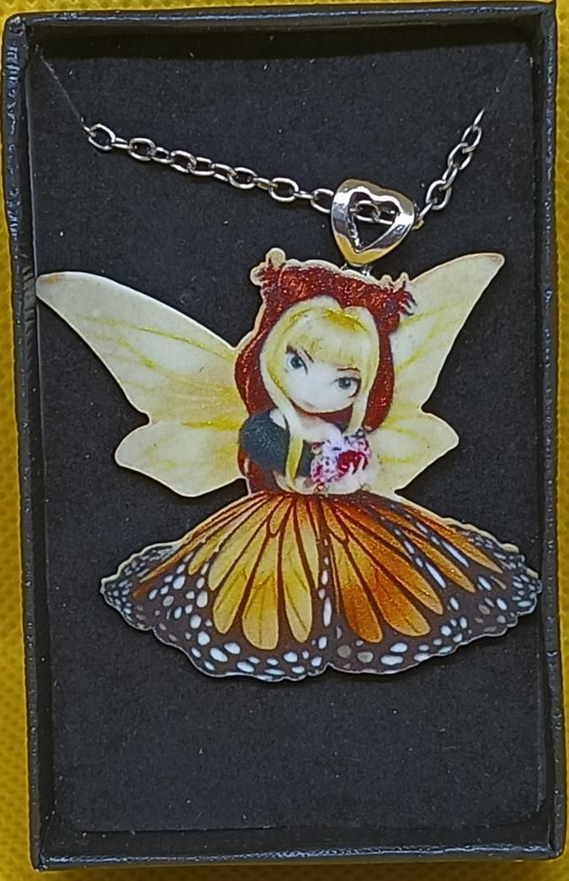 Plastic Yellow Butterfly Fairy Pendant Necklace.