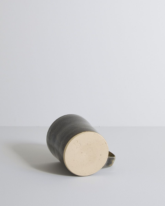 A single mug in blue mist