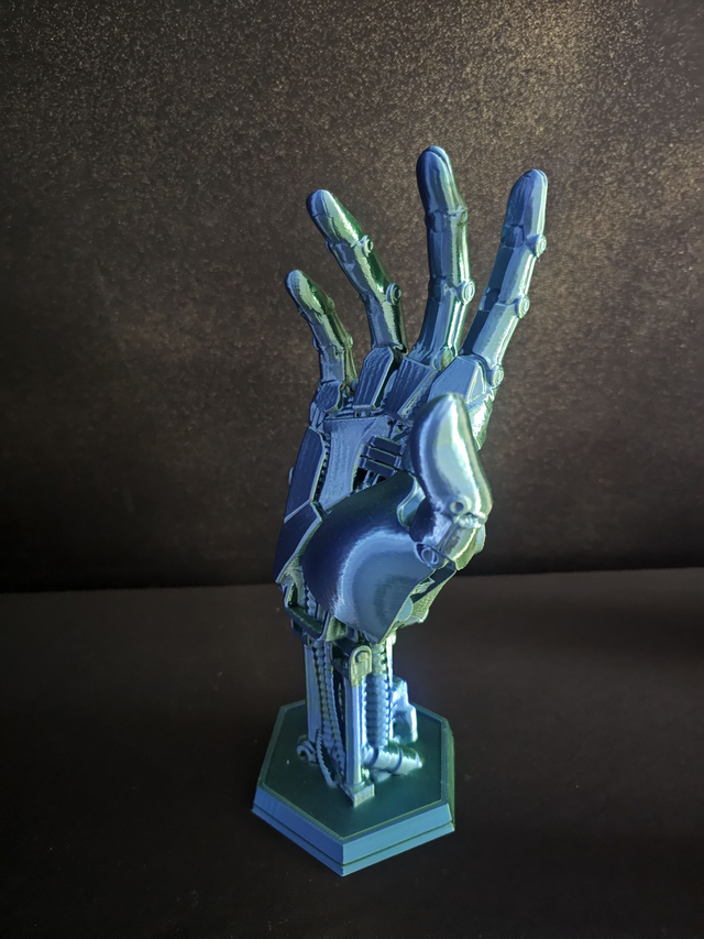 Porte manette main robotique bleu