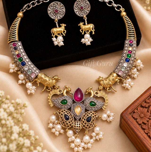 Fusion and traditional mix Gold-toned Nandi (bull) figures, peacocks, and floral elements 
