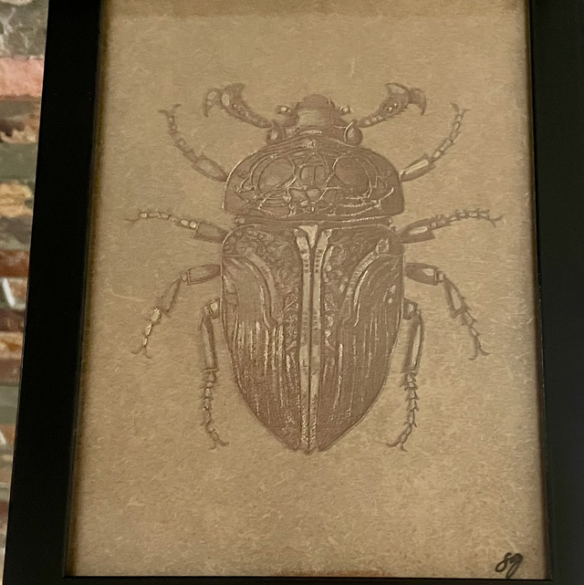 Petit scarabée doré 1